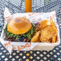 LA Historic Bleu Burger · Bleu cheese, bacon, arugula, tomato, and balsamic glaze. Served with chips and slaw