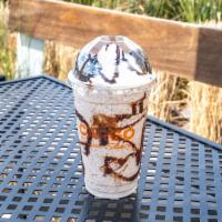 Oreo Cookie Shake · Oreo cookie crumble with chocolate drizzle topped with Oreo cookie and whipped cream.
