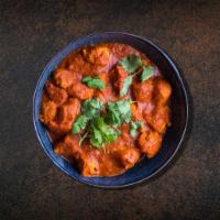 Chicken Tikka Charger · Chicken pieces roasted in a clay oven and tossed in a creamy tomato sauce served with a side...
