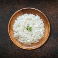 Steamed Rice · Our long grain aromatic basmati rice, steamed to perfection 
