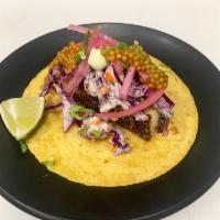 Fish Taco · Pan seared Ahi, wasabi garlic coleslaw, pickled red onions, pickled mustard seeds in honey