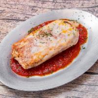 Lasagna	 · Fresh pasta, layered with meat sauce, ricotta	 and mozzarella cheese, baked to perfection.