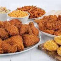 FAMILY MEAL  · CHICKEN AND TINDERS
12 PC CHICKEN MIX
6 PC CAJU TENDERS
6 PC BISCUITS AND FRIES