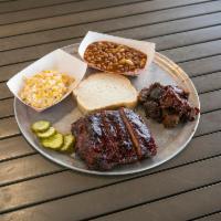 2 Meats 2 Sides Plate · Choice of 2 Meat and 2 Sides served with pickles and Bread