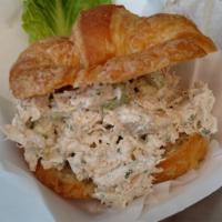 Chicken Salad Croissant · Chicken breast  with celery, onions and homemade sauce served on a buttery flaky croissant.