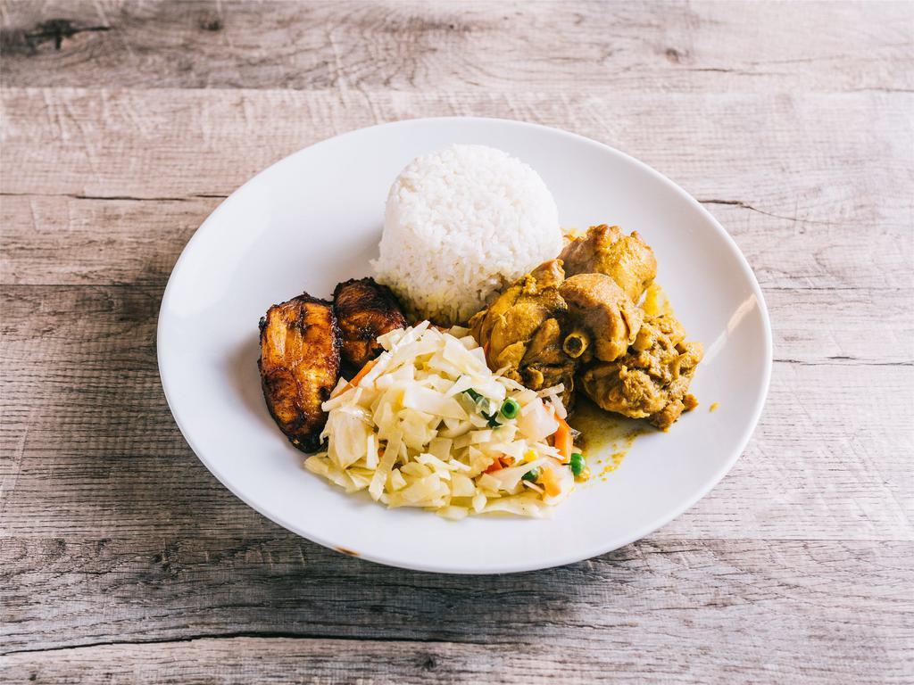 Curry Chicken · Served with a choice of rice and peas, or white rice with vegetables and plantain.