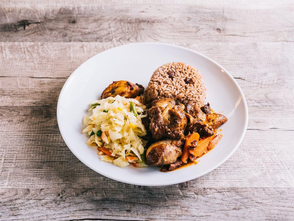 Brown Stew Chicken · Served with a choice of rice and peas, or white rice with vegetables and plantain.