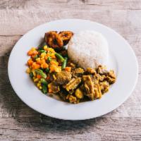 Curry Goat · Served with a choice of rice and peas, or white rice with vegetables and plantain.
