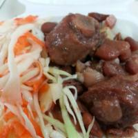 Stew Peas · Beef, oxtail, and pigtail simmered and stewed with light red kidney beans.