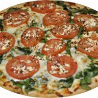 Roma Spinach Pizza · Fresh spinach, Roma tomatoes, feta cheese, fresh garlic and mozzarella cheese.