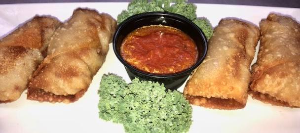 Pizza Logs · Pepperoni, mozzarella cheese and pizza sauce rolled up in egg roll wrappers and deep fried. (just like pizza)