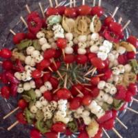 Caprese Skewers · Fresh mozzarella, tomatoes and tortellini on a skewer with balsamic glaze and fresh basil.(4...