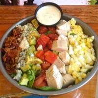 Cobb Salad · Fresh greens with grilled chicken, tomatoes, egg, bacon, avocado and bleu cheese crumbles.