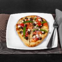 Mediterranean Flatbread · Tomatoes, black olives, green peppers, feta cheese and purple onions. Add chicken for an add...