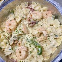 Latitudes Pasta · Bow tie pasta with sautéed chicken, mushrooms, green peppers and sun-dried tomatoes tossed i...