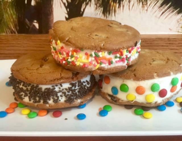 Ice Cream Cookie Sandwich · Vanilla or Chocolate Ice cream sandwiched between to large gourmet chocolate chunk cookies.