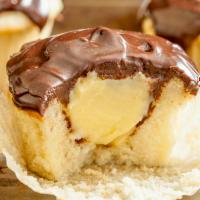 Boston Cream Cupcakes · Vanilla cupcakes filled with vanilla custard and topped with Chocolate Ganache