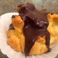 Cream Puffs · Fresh baked pastry filled with vanilla custard and topped with chocolate ganache