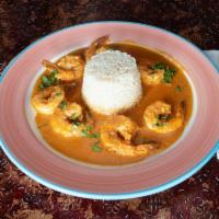 Camarones al Ajillo · Shrimp sauteed with hot dried chilies in a garlic and white wine sauce. Served with white ri...
