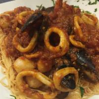 Seafood Combo Marinara · Served with mussels, calamari, scallop and shrimp, sautéed in our homemade garlic marinara s...