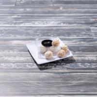 Coconut Macaroons · coconut shreds*, sprouted almonds*, coconut butter*, vermont maple syrup*, extra virgin coco...