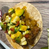  Jerk Chicken Tacos (two tacos) · Grilled Jerk seasoned chicken, topped with pico de gallo & mango sauce. *All sauces and topp...