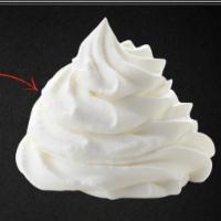 Packed Whipped Cream · Homemade fluffy whipped cream dip packed in plastic container for ugnuts.
