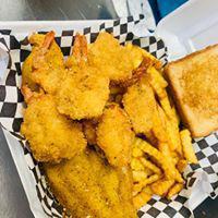Catfish Fillets · With fries, pickles, peppers, bread.