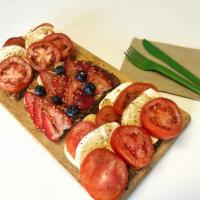 Nut Butter and Fruit Toast · Organic 21 whole grain bread with choice of natural peanut or almond butter, bananas, strawb...