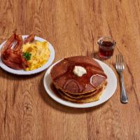 Lumberjack · Pancakes or French toast with two eggs, bacon, ham or sausage.