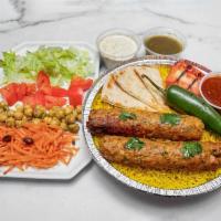 Seekh (Kofta) Kebab Platter · Our ground chicken mixed with onions, garlic, ginger, parsley and spices and Served over bas...