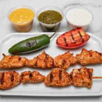 Chicken Kebab · Chef's Favorite Grilled Chicken Breast W/Peppers, and onions Charbroiled on a Skewer.