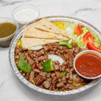 Lamb Gyro Platter · Our New York Style Famous Juicy Lamb Gyro platter over Basmati Rice or Salad served with pit...