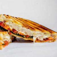 2. Chicken Parmigiano Panini · Breaded chicken, marinara sauce, Parmesan cheese and fresh mozzarella cheese.