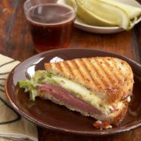 10. The Combo Panini · Hot pastrami and corned beef, provolone cheese, tomatoes and mustard.