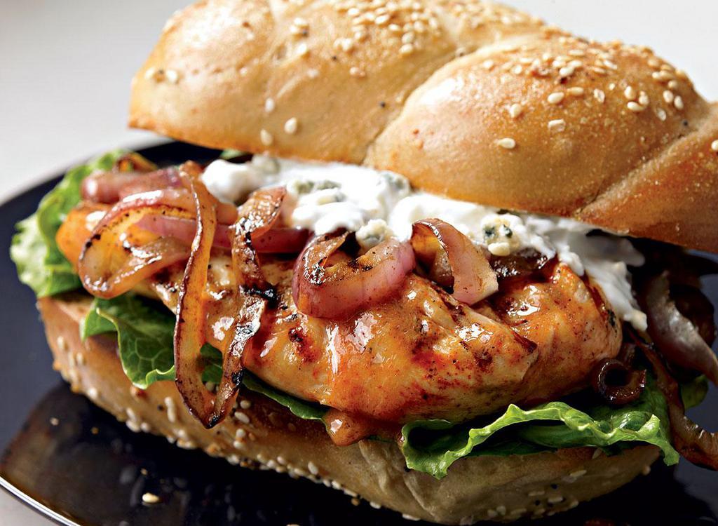 5. Buffalo Chicken Hero · Grilled Buffalo chicken, bacon, Swiss, lettuce, tomatoes and blue cheese dressing.