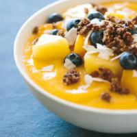 3. Tropical Yogurt Parfait · Pineapple, mango, coconut flakes and granola.