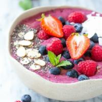 4. Berry Passion Acai Bowl · Strawberries, raspberries, blueberries, almond milk, organic raw agave and granola.