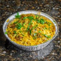 Chicken Biryani · Flavorful long-grain basmati rice cooked in layers of meat and spices.