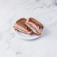 J&J Sandwich · Roast beef, ham, on 3 slices of rye bread with mayo, salt and pepper, and thinly sliced pick...