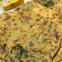 12. Palak Paratha · Whole wheat bread stuffed with Spanish pepper and onions cooked in a pan. Freshly baked brea...