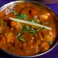 2. Vindaloo · Vinegar, hot chilies and spices make this a very hot dish. Served with basmati rice.
