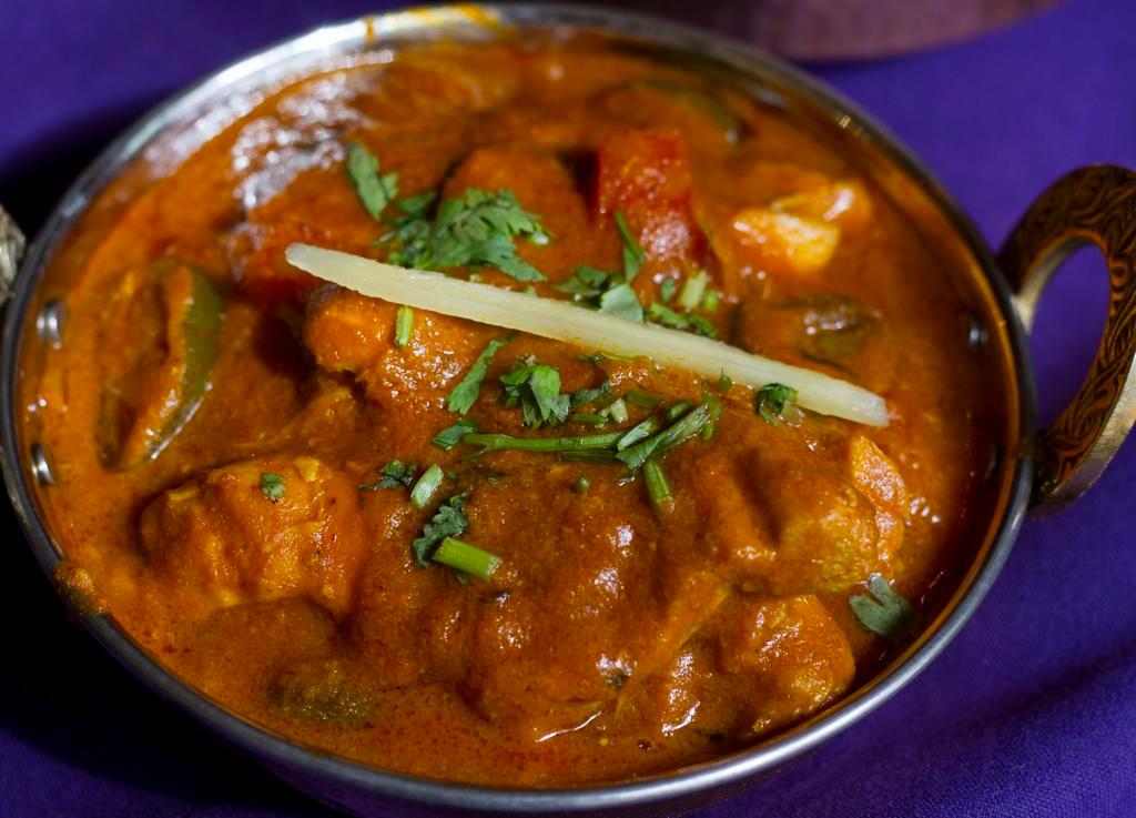 2. Vindaloo · Vinegar, hot chilies and spices make this a very hot dish. Served with basmati rice.