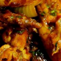 7. Masala Korahi · Cooked with onions, garlic ginger, coriander and spices masala sauce. Served with basmati ri...