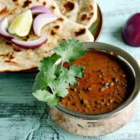 2. Daal Makhni · Mixed black grain lentils with tomato flavor. Served with basmati rice.