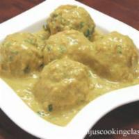 8. Malai Kofta · Vegetable balls in masala and cream sauce. Served with basmati rice.