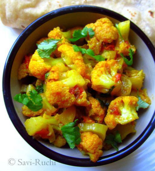 13. Aloo Gobi · Potato and cauliflower with cumin and spices. Served with basmati rice.