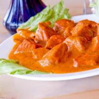8. Chicken Tikka Masala  · Cooked with tomato and cream sauce. Served with basmati rice.