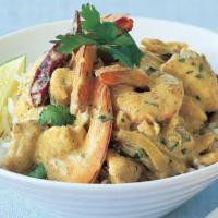 5. Shrimp Korma · Shrimp cooked with mild cream and almonds sauce. Served with basmati rice.
