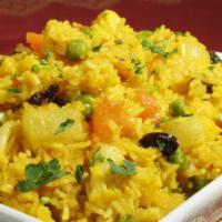 4. Kashmiri Pulao · Saffron rice with fruits.